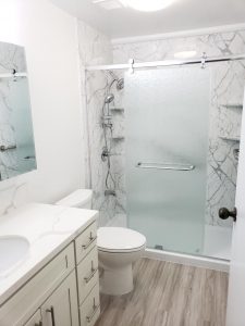 Hanford Shower Remodel Calcutta Marble Wall Walk In Shower client 225x300
